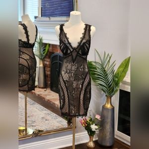 Bebe lace illusion dress. Color: Black Size: Small.